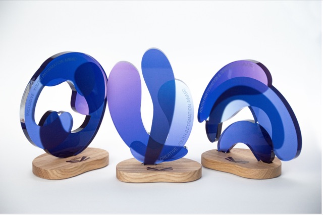 Youth Information Award trophies, trio